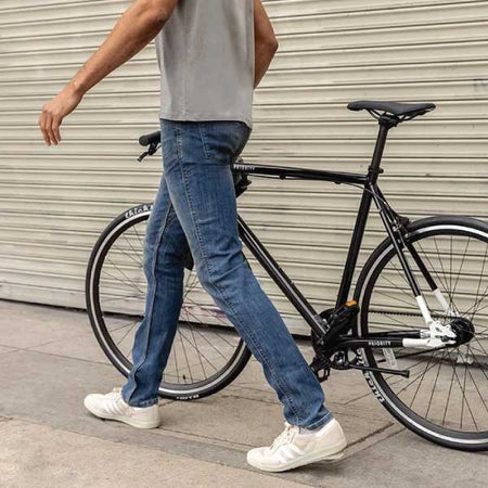 Man walking with a bike
