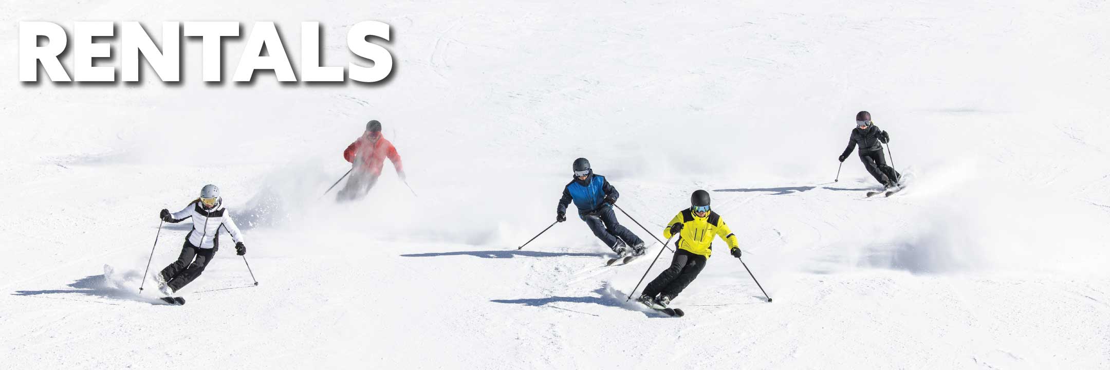 Skiers skiing down the hill