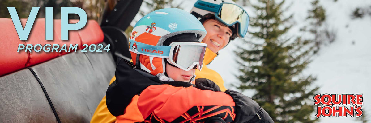 Mother and son on a ski chairlift