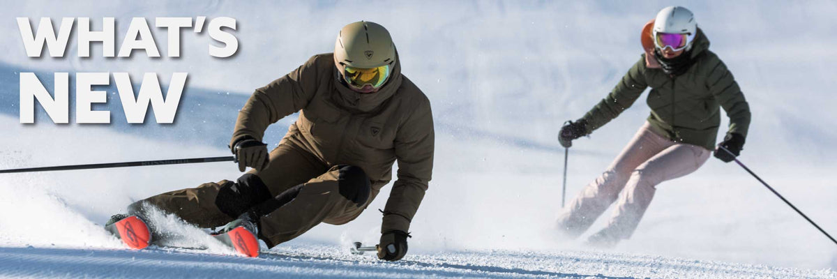Skiers descending the mountain
