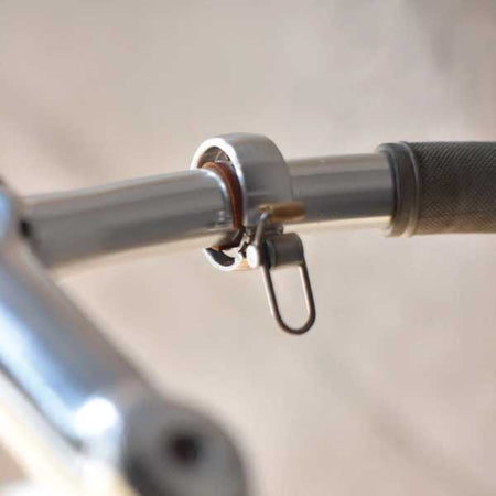 knog bike bell on a handlebar
