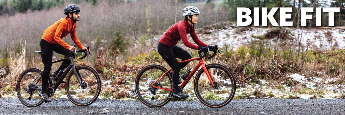 Couple cycling on a gravel road