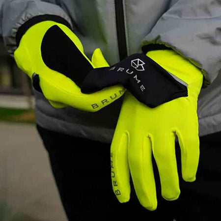 gloves being fastened by a man