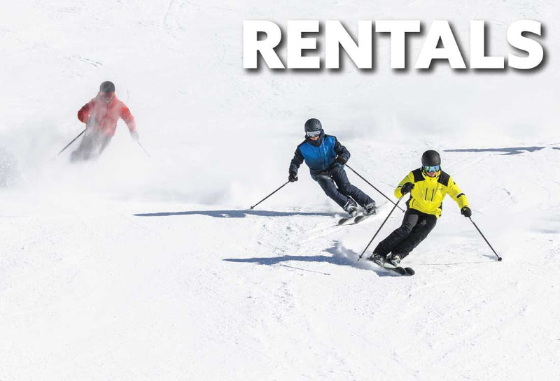 Skiers skiing down the hill