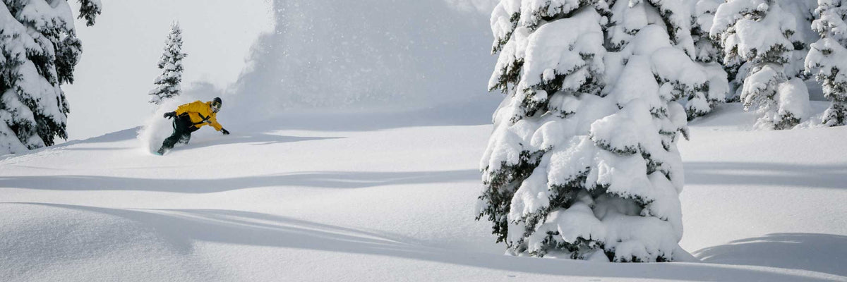 snowboarder in deep powder