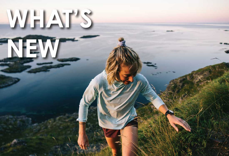 woman hiking up a hill